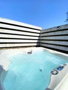 a jacuzziificialificialificialificialificialificialificialificialificialificialificial at Otter 2 HuntersMoon- Warminster-Wiltshire-Bristol in Warminster