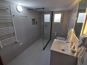 Koupelna v ubytování Leatis Apartment