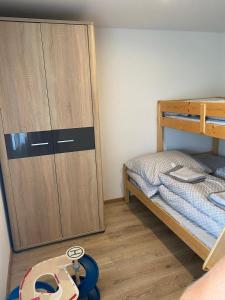 Postel nebo postele na pokoji v ubytování Apartmány Domaša Poľany