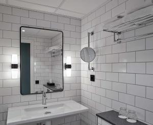 A bathroom at Scandic Klara