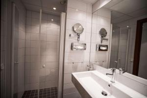 A bathroom at Scandic Klara