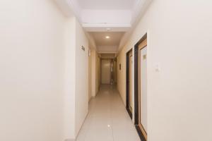 Fotografie z fotogalerie ubytování Capital O Orbit Inn Near Infiniti Mall v Bombaji