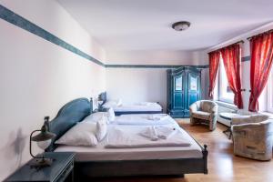 Llit o llits en una habitació de U-Nautic Restaurant & Pension