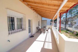 Balkón nebo terasa v ubytování Leon Home by RentalsPro - Mouries Halkidiki