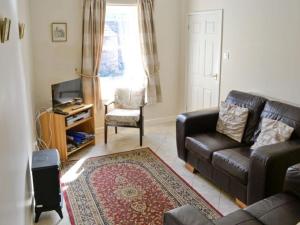 Posezení v ubytování Church view cottage