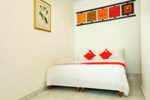 Ένα ή περισσότερα κρεβάτια σε δωμάτιο στο OYO Hotel Cabo Del Sur, Cabo San Lucas