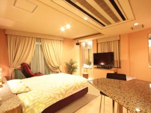 TV o dispositivi per l'intrattenimento presso G HOTEL 一宮 -Hotel & Resorts-