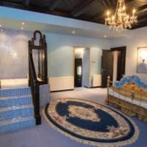 Giường trong phòng chung tại Sinaia Casa cu Farfurii +9 ảnh
