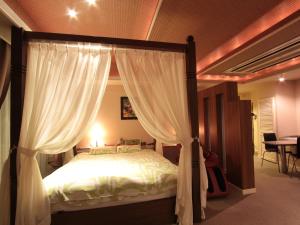 Letto o letti in una camera di G HOTEL 一宮 -Hotel & Resorts-
