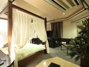 Letto o letti in una camera di G HOTEL 一宮 -Hotel & Resorts-