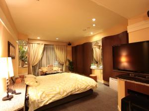 Letto o letti in una camera di G HOTEL 一宮 -Hotel & Resorts-