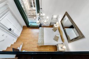 an overhead view of a living room with a chandelier at Palmotta Palace in Dubrovnik