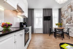 Kuchyňa alebo kuchynka v ubytovaní Happy Stay Apartments Osiek + 9 fotografií