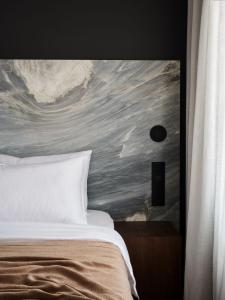Postel nebo postele na pokoji v ubytování Hotel Reja, a Member of Design Hotels