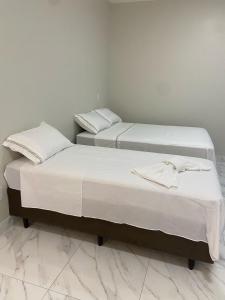 Postel nebo postele na pokoji v ubytování Flats Teles 1