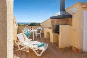 A balcony or terrace at Aparthotel Ona Cala Pi Club