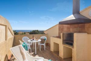 A balcony or terrace at Aparthotel Ona Cala Pi Club