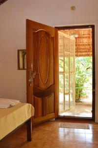 Katil atau katil-katil dalam bilik di Sri Anantha Niketan Ashram