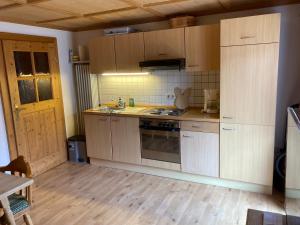 Kuchyň nebo kuchyňský kout v ubytování Ferienwohnung Heilingbrunner