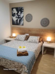 Posteľ alebo postele v izbe v ubytovaní Precioso apartamento a menos de 100m de la playa + 26 fotografií