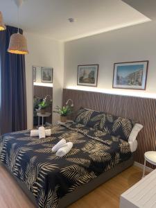 A bed or beds in a room at Hotel La Pergola di Venezia
