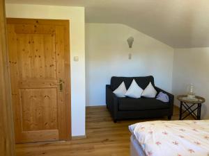 Postel nebo postele na pokoji v ubytování Ferienwohnung Heilingbrunner