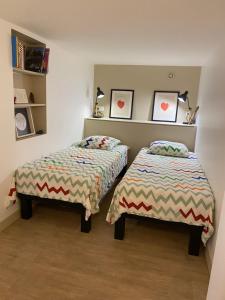 Postel nebo postele na pokoji v ubytování Corse du Sud Villa les pieds dans l'eau !