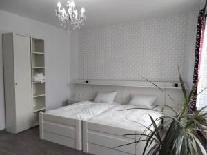 Postel nebo postele na pokoji v ubytování Villa EDEN BLICK