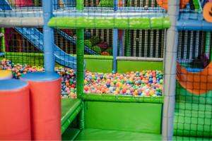 a play room filled with lots of balls at Prawdzic Family Resort & Wellness in Gdańsk
