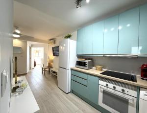 Kuchyň nebo kuchyňský kout v ubytování R39 Modern One bedroom Alcantara