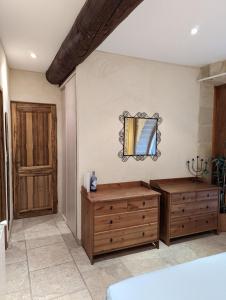 Postel nebo postele na pokoji v ubytování L'Orangerie Studio