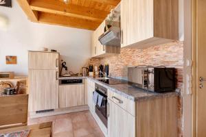 Cuisine ou kitchenette dans l'établissement Ferienwohnung Beni
