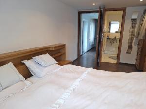 Postel nebo postele na pokoji v ubytování Villa EDEN BLICK