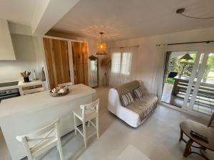 Posedenie v ubytovaní Casa con Jardín Privado, Chimenea y Piscina Comunitaria, cerca del Golfo y Playa de Pals - ES-226-31