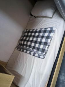 Postel nebo postele na pokoji v ubytování Hola backpacker Hostel 2