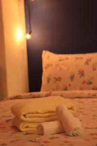 Letto o letti in una camera di 小島月光民宿 Moonlit Isle