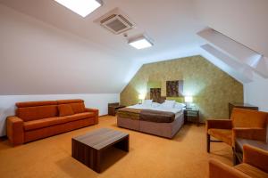 Χώρος καθιστικού στο Hotel BELASSI