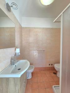 Ένα μπάνιο στο Sweet Sun Sorrento Coast Apartments