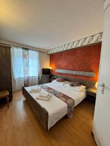 Postel nebo postele na pokoji v ubytování Hotel Post Cunter Biancardi