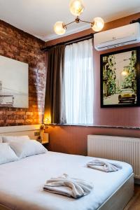 Ένα ή περισσότερα κρεβάτια σε δωμάτιο στο Cheers Porthouse