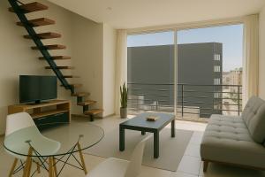TV a/nebo společenská místnost v ubytování Matrisa Santa Teresa Apartments