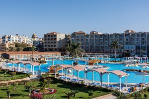 an aerial view of a resort with a large swimming pool at Sunrise Solara Aqua park Resort in Hurghada