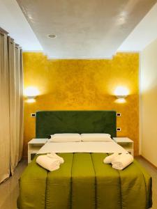 Postel nebo postele na pokoji v ubytování TMS Venice Rooms