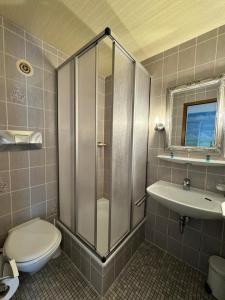 Koupelna v ubytování Hotel Post Cunter Biancardi