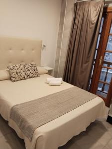 Postel nebo postele na pokoji v ubytování Hotel Océano Centro
