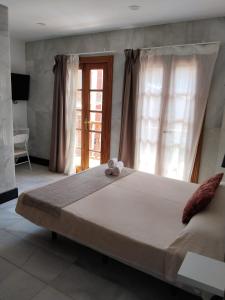 Postel nebo postele na pokoji v ubytování Hotel Océano Centro