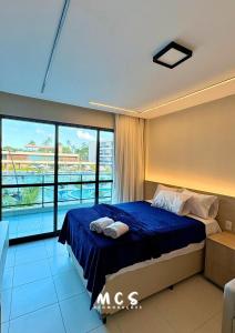 En eller flere senge i et værelse på Luxury and comfort in Muro Alto + 32 billeder