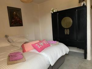 Postel nebo postele na pokoji v ubytování Masia Katmandu