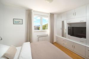 Postel nebo postele na pokoji v ubytování Comfortable Apartment