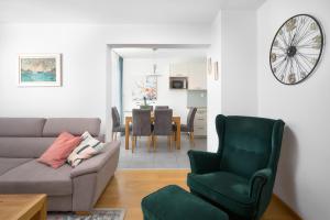 Posezení v ubytování Comfortable Apartment